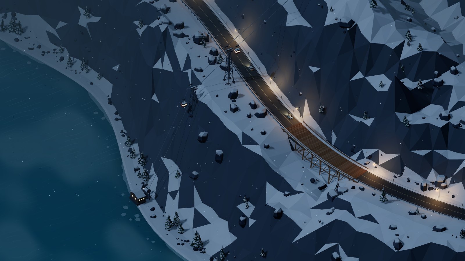 Snowy alpine road at night