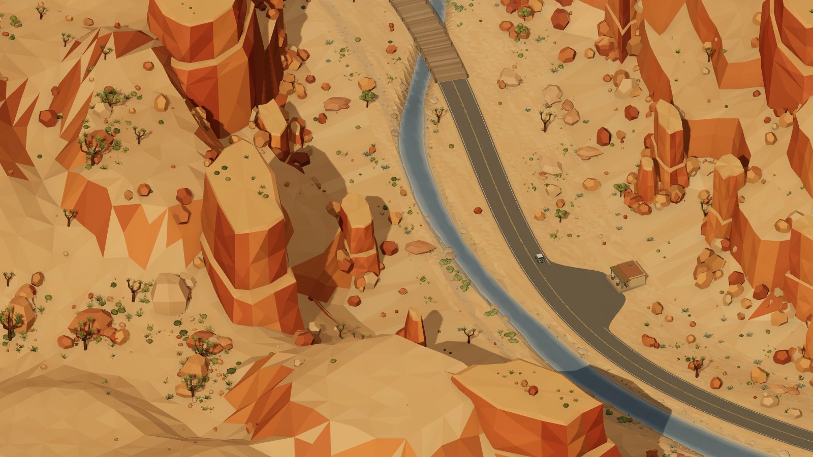 Winding road through red rock cliffs